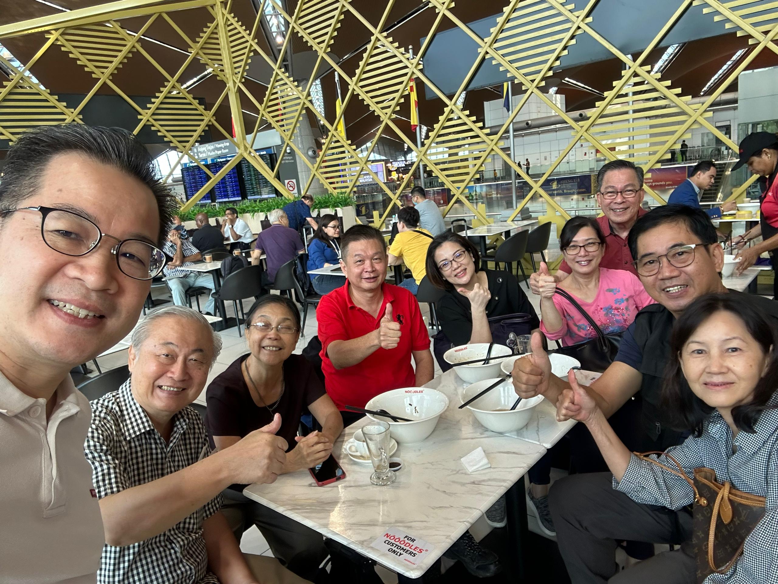 MYICCC friends enjoying fellowship over a meal